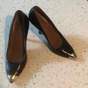 Black and silver pumps